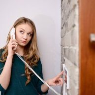 woman talking on the intercom